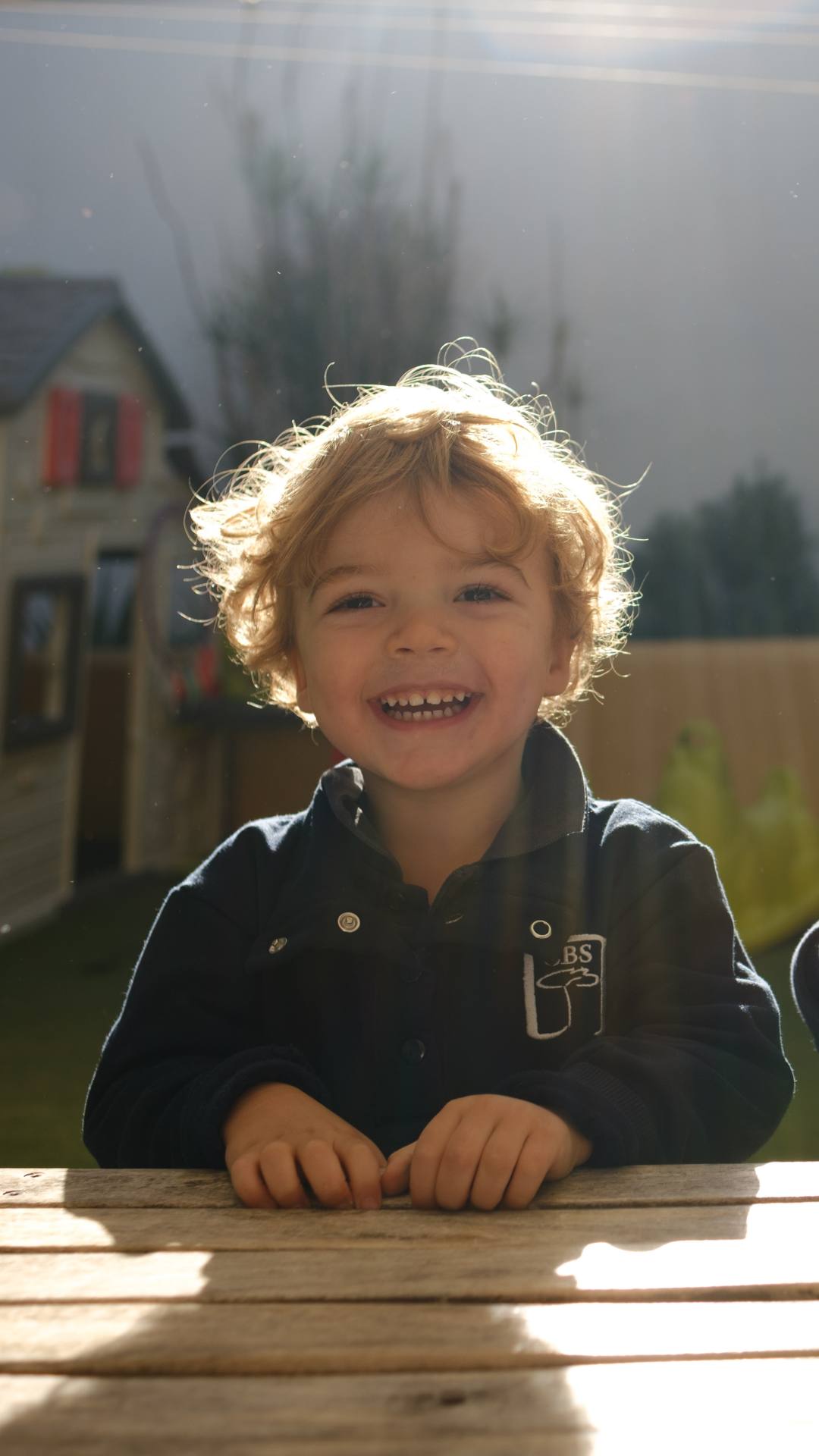 Happy child learning naturally in English at CBS Pre-School
